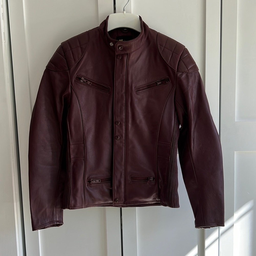 Superior oxblood red motorcycle jacket. Heavy duty leather and fully insulated.